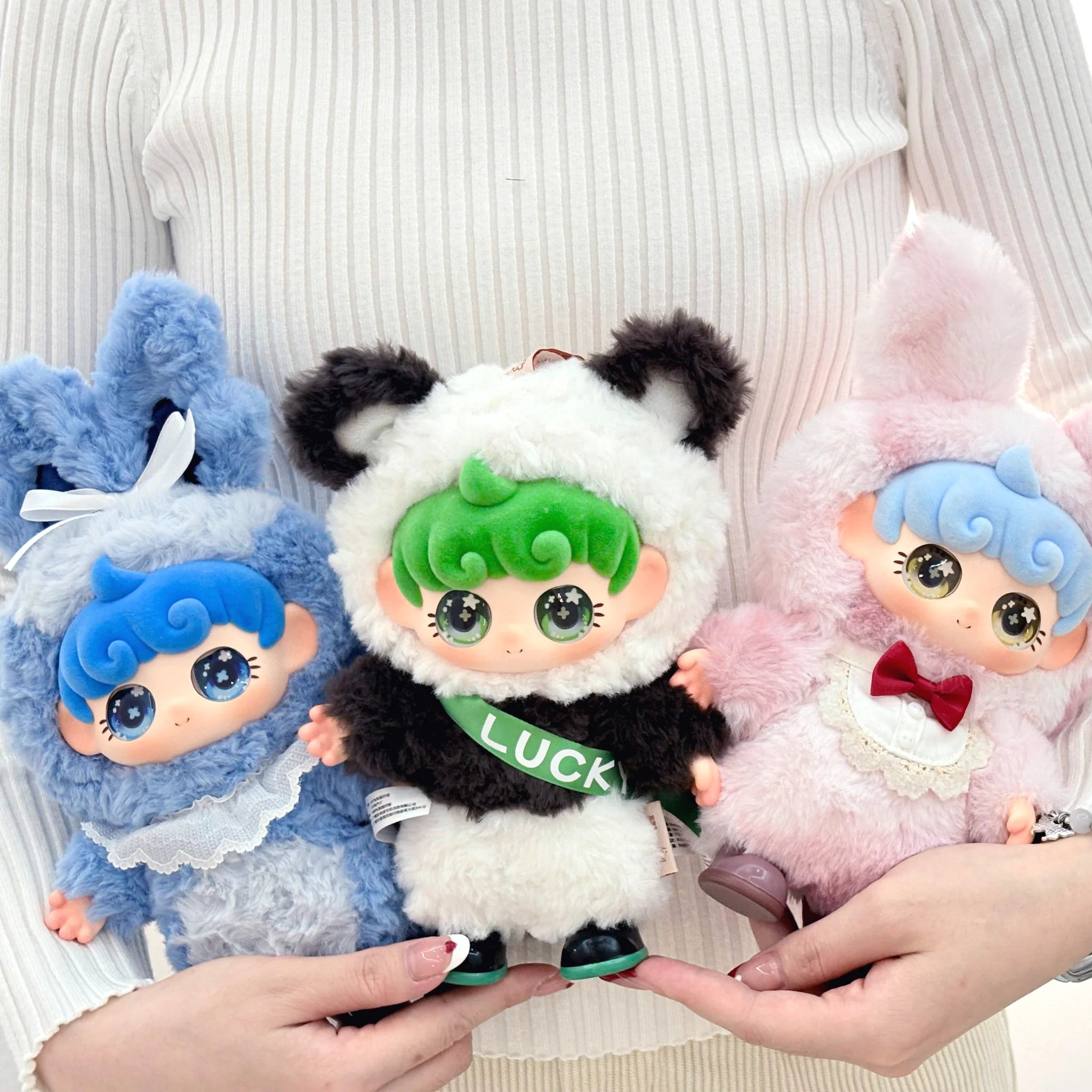 SpringHouse "UNAbaby Cozy Curls Full-Body: Wave 3 - Reversed Dream" series art toy figures in a lifestyle display scene: 2