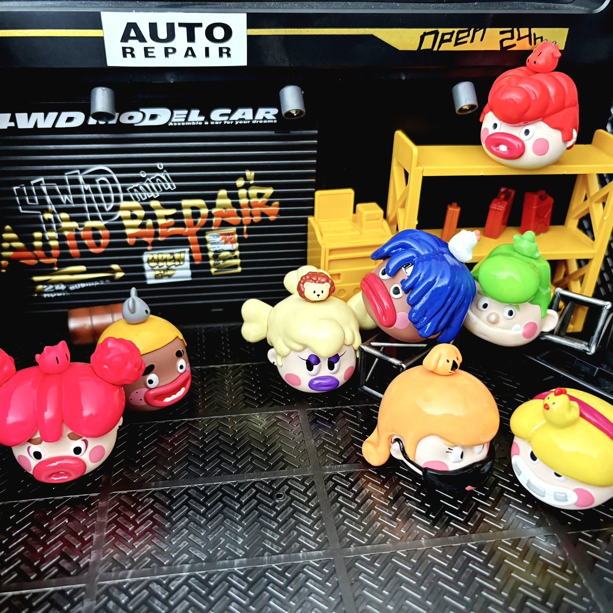 SpringHouse "Ugly-Cute Family: Wave 4 - Campus Chaos" series art toy figures in a lifestyle display scene: 2