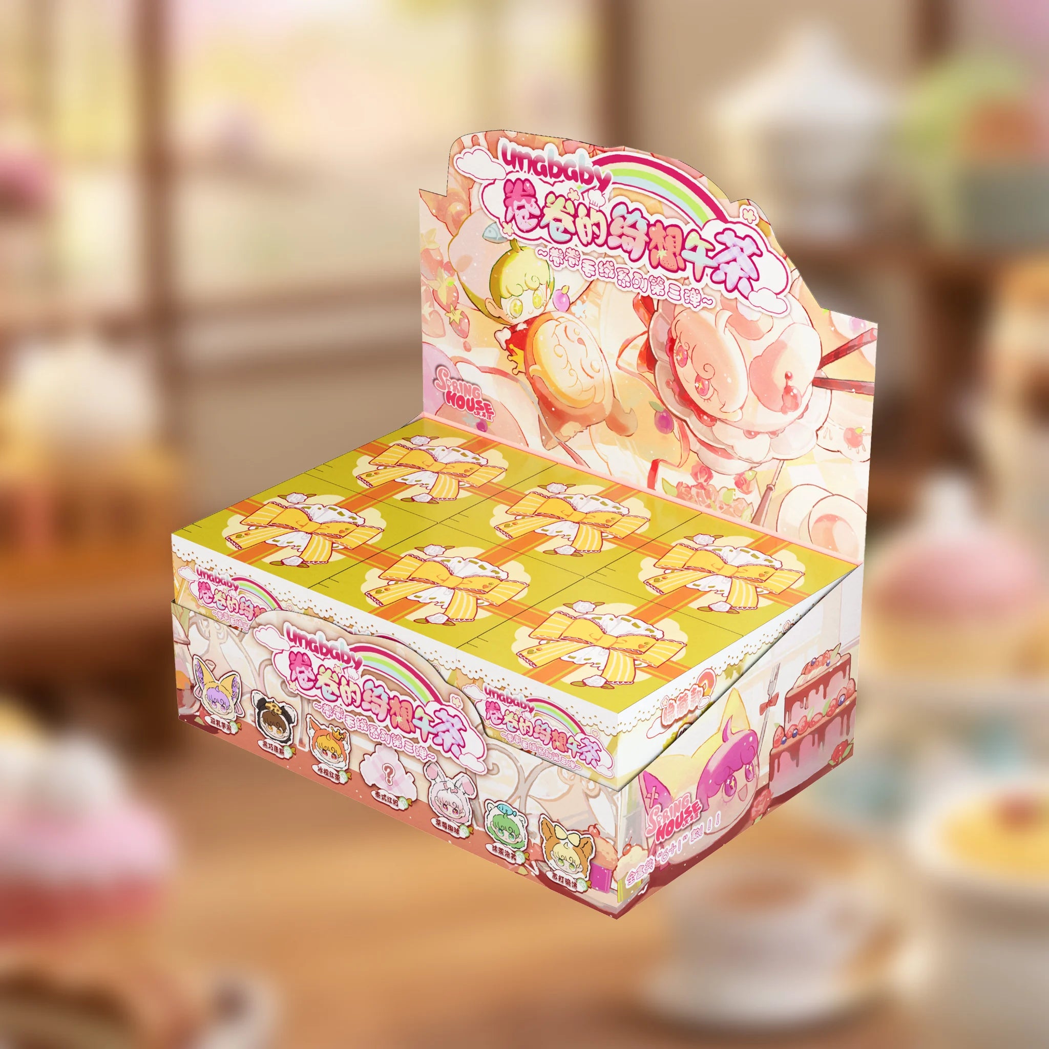 Full retail display case for the SpringHouse "UNAbaby Cozy Curls: Wave 3 - Whimsy Tea Party" series, containing multiple blind boxes.