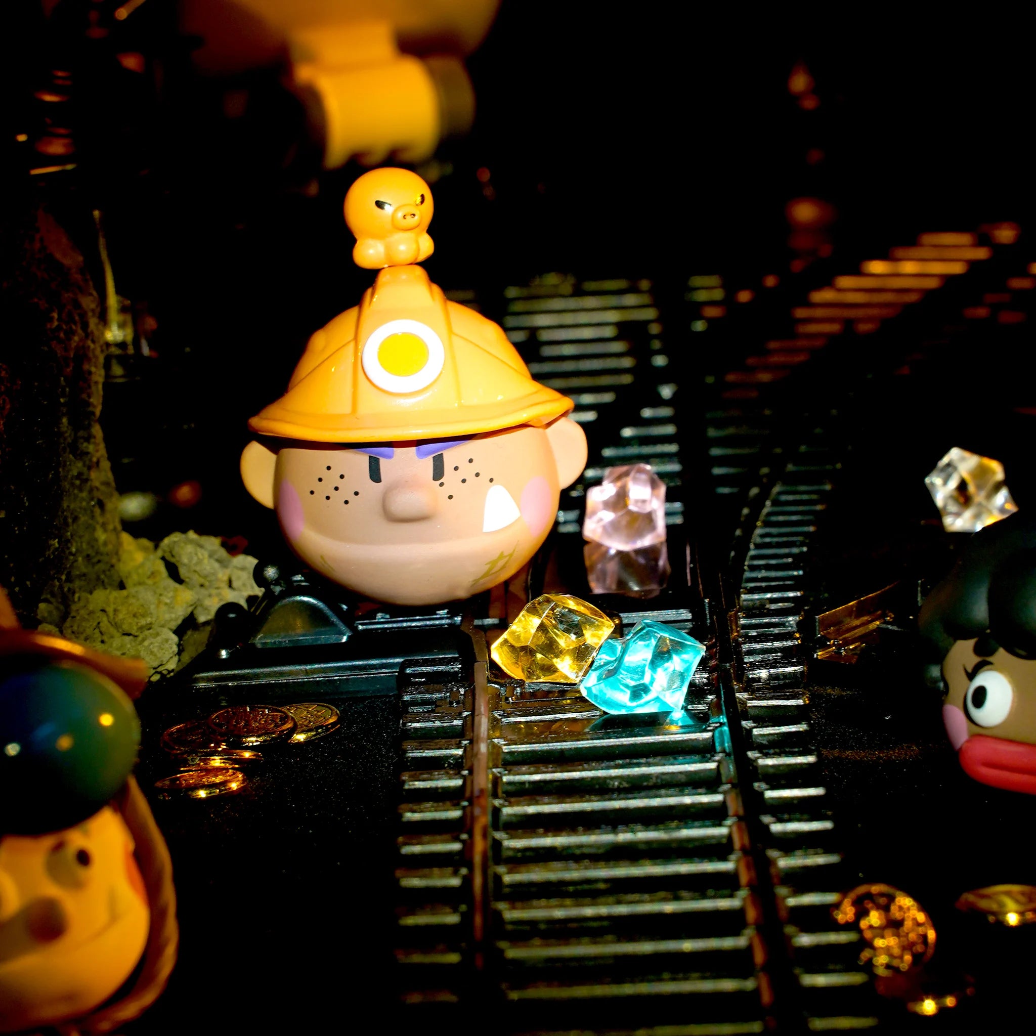 Spring House "Ugly-Cute Family:Wave 6 -Exavation GodGold" series art toy figures in a lifestyle display scene: 